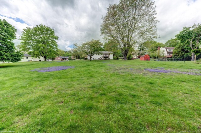 21 Summit Farms Rd, Southington, CT 06489 - view of grassy yard with a storage shed and an outbuilding