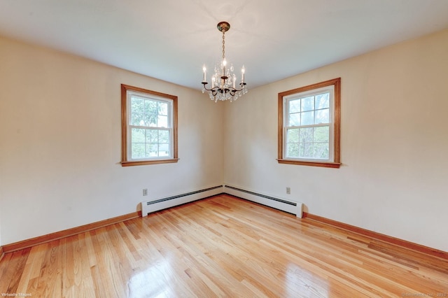 21 Summit Farms Rd, Southington, CT 06489 - spare room with a chandelier, light wood-style floors, a baseboard radiator, and baseboards