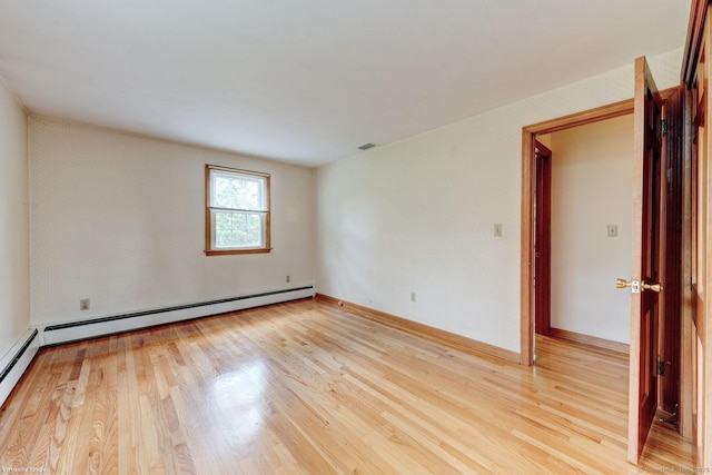 21 Summit Farms Rd, Southington, CT 06489 - spare room featuring a baseboard heating unit, light wood finished floors, and baseboards