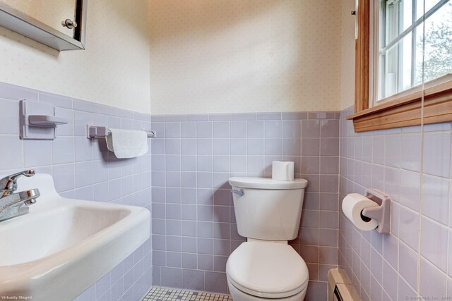 21 Summit Farms Rd, Southington, CT 06489 - bathroom with wallpapered walls, a sink, tile walls, toilet, and wainscoting