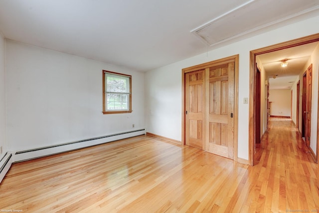 21 Summit Farms Rd, Southington, CT 06489 - unfurnished bedroom featuring attic access, light wood-type flooring, baseboard heating, and baseboards