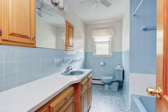 21 Summit Farms Rd, Southington, CT 06489 - bathroom with ceiling fan, baseboard heating, toilet, tile walls, and vanity