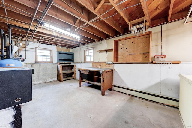 21 Summit Farms Rd, Southington, CT 06489 - basement with a workshop area and a baseboard heating unit