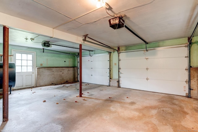 21 Summit Farms Rd, Southington, CT 06489 - garage featuring a garage door opener and heating fuel