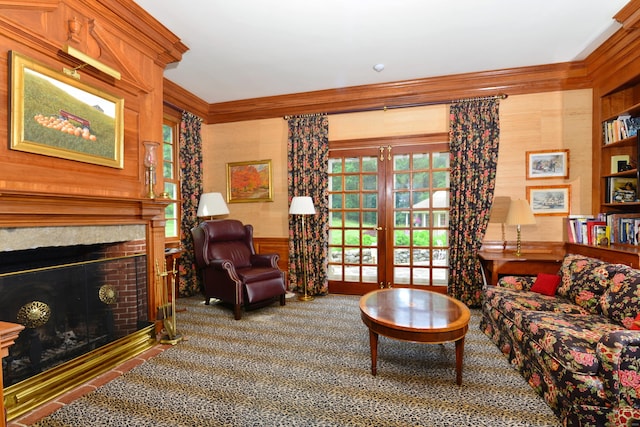 175 Pulpit Rock Rd, Woodstock, CT 06281 - living room featuring ornamental molding, carpet floors, a fireplace, and french doors