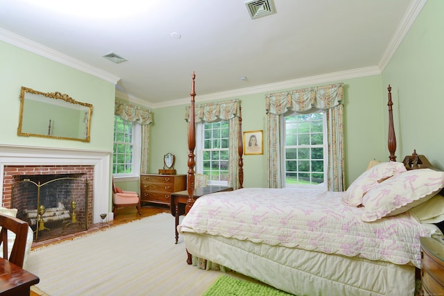 175 Pulpit Rock Rd, Woodstock, CT 06281 - bedroom featuring ornamental molding, multiple windows, wood finished floors, and a fireplace