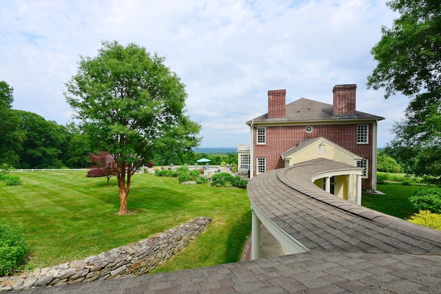 175 Pulpit Rock Rd, Woodstock, CT 06281 - view of side of property with a chimney and a yard