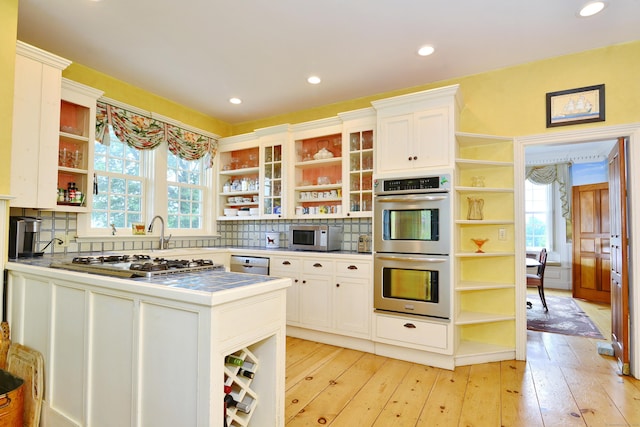 175 Pulpit Rock Rd, Woodstock, CT 06281 - kitchen with open shelves, stainless steel appliances, white cabinetry, and recessed lighting