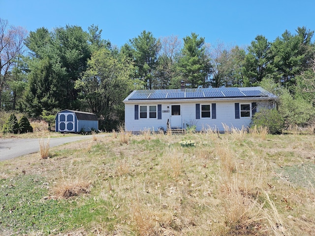 30 Huntley Rd, Killingly, CT 06241 - single story home with a storage shed, an outbuilding, metal roof, and entry steps