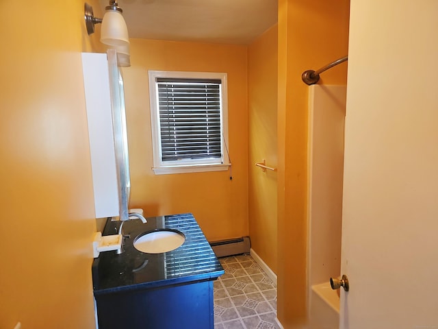 30 Huntley Rd, Killingly, CT 06241 - full bath featuring a baseboard radiator, a shower, vanity, and a bath