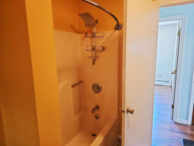 30 Huntley Rd, Killingly, CT 06241 - full bathroom featuring wood finished floors, baseboard heating, and shower / bath combination