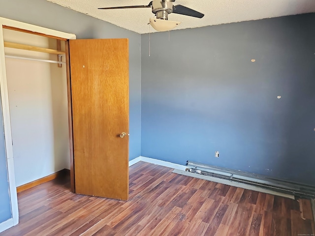 30 Huntley Rd, Killingly, CT 06241 - unfurnished bedroom featuring wood finished floors, a closet, and baseboards