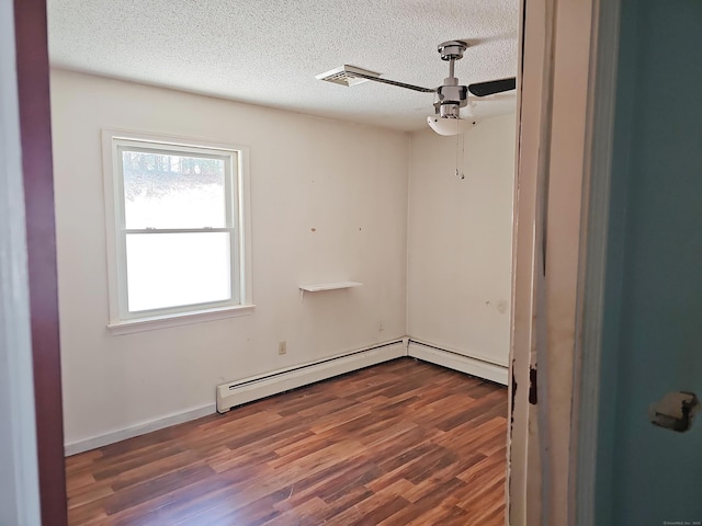 30 Huntley Rd, Killingly, CT 06241 - empty room featuring a ceiling fan, wood finished floors, a textured ceiling, and a baseboard heating unit