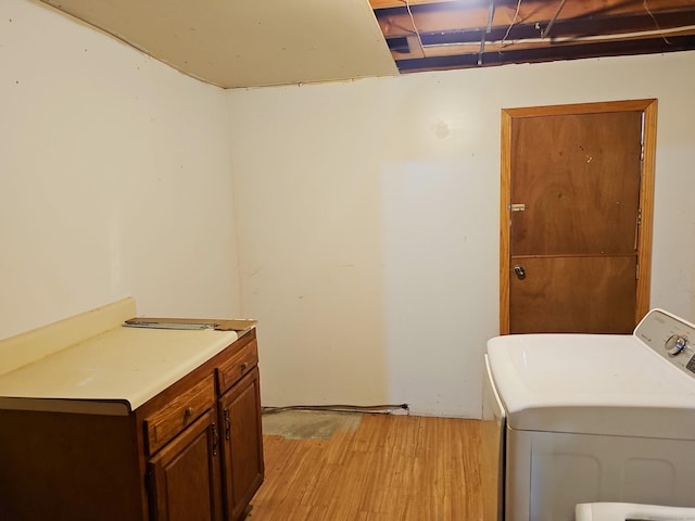 30 Huntley Rd, Killingly, CT 06241 - washroom with washer / clothes dryer and light wood-style flooring