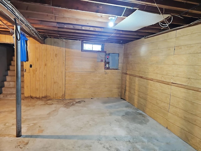30 Huntley Rd, Killingly, CT 06241 - below grade area featuring wooden walls, stairway, and electric panel