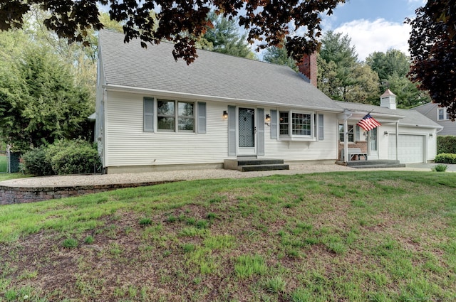 39 Eastgate Ln, Enfield, CT 06082 - view of front of property with a garage, a front lawn, and a chimney