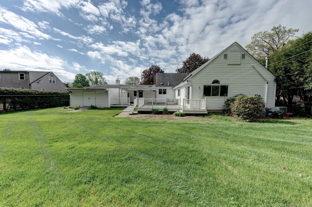 39 Eastgate Ln, Enfield, CT 06082 - back of house featuring a wooden deck and a lawn