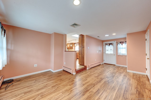 39 Eastgate Ln, Enfield, CT 06082 - entrance foyer with a baseboard radiator, light wood-style floors, baseboards, and recessed lighting