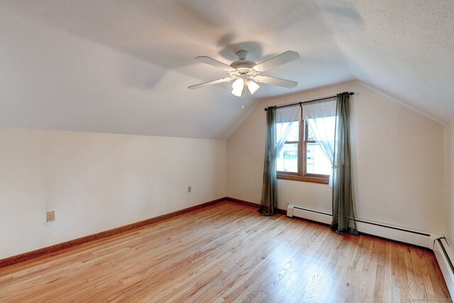 39 Eastgate Ln, Enfield, CT 06082 - bonus room featuring light wood-style flooring, a textured ceiling, lofted ceiling, ceiling fan, and baseboards
