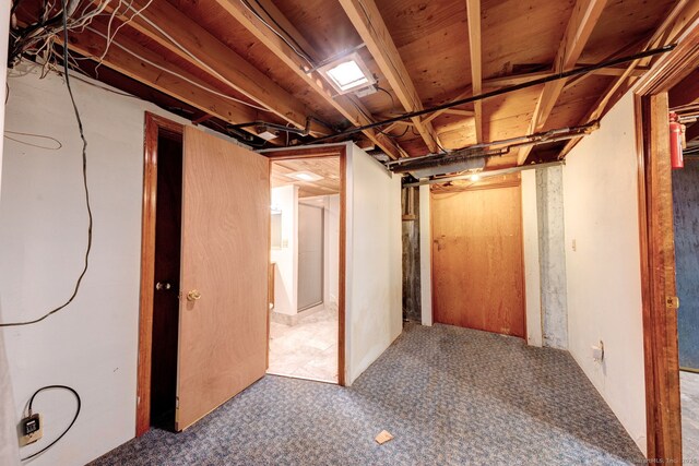 39 Eastgate Ln, Enfield, CT 06082 - unfinished below grade area with carpet