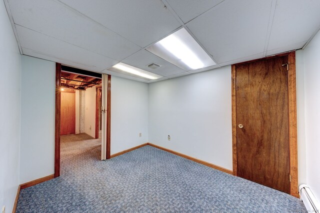 39 Eastgate Ln, Enfield, CT 06082 - finished basement with a baseboard radiator, carpet flooring, and baseboards