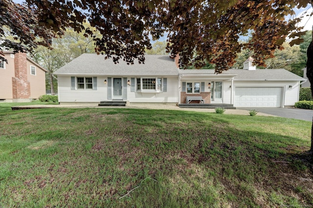 39 Eastgate Ln, Enfield, CT 06082 - ranch-style home with a front yard, driveway, an attached garage, and brick siding