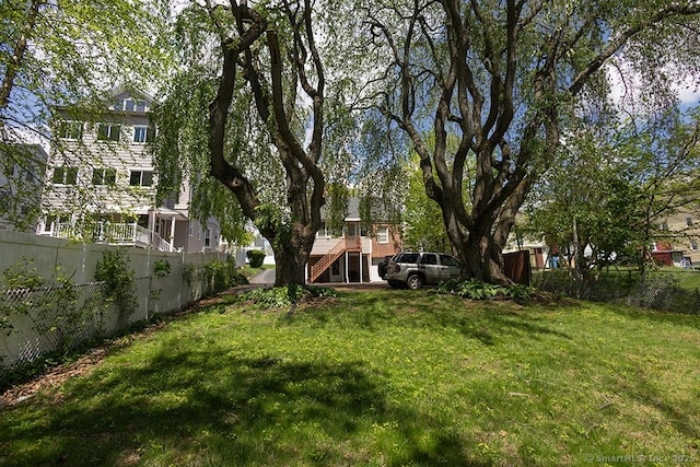 view of yard featuring stairs