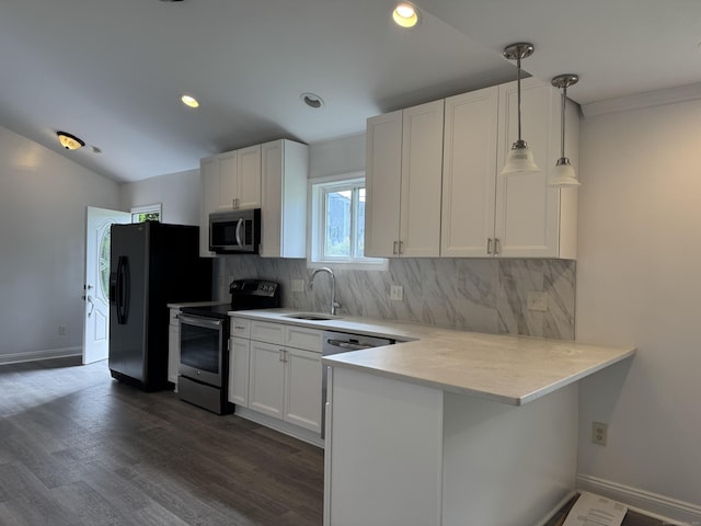 39 Medford St, West Haven, CT 06516 - kitchen featuring appliances with stainless steel finishes, a sink, white cabinets, light countertops, and decorative backsplash