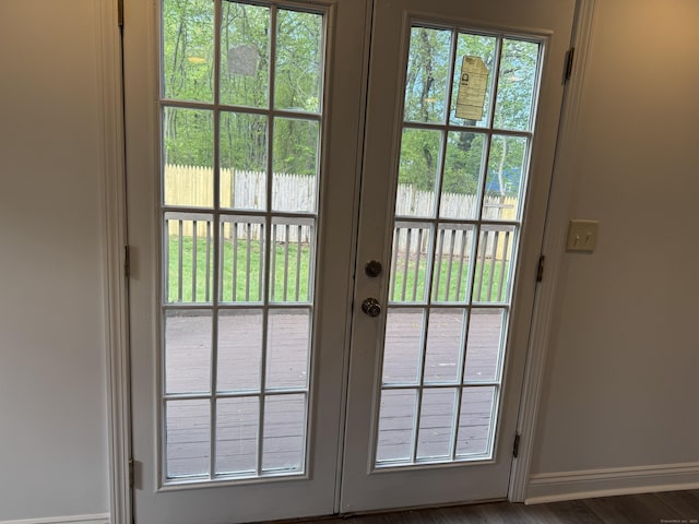 39 Medford St, West Haven, CT 06516 - doorway to outside featuring french doors, baseboards, and dark wood finished floors