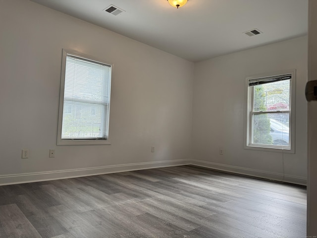 39 Medford St, West Haven, CT 06516 - empty room with wood finished floors and baseboards
