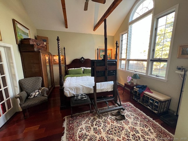 bedroom with wood finished floors and multiple windows