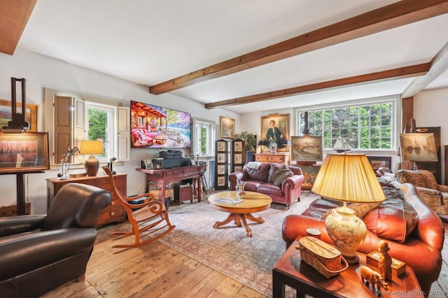 9 Columbus Ave, East Lyme, CT 06357 - living area with wood-type flooring and beam ceiling
