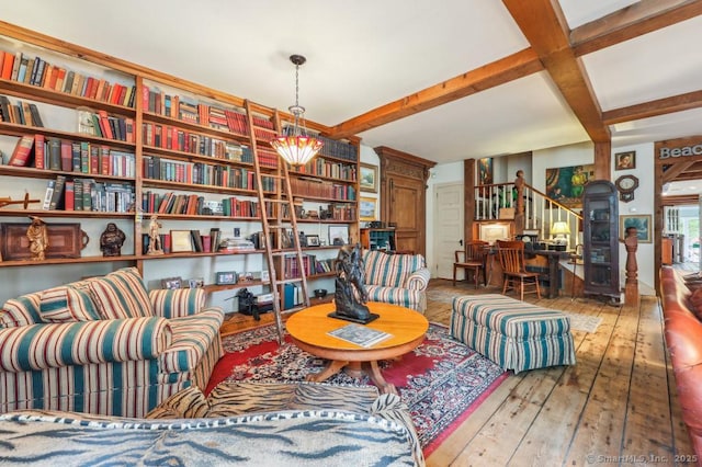 9 Columbus Ave, East Lyme, CT 06357 - sitting room featuring hardwood / wood-style floors, beam ceiling, and coffered ceiling