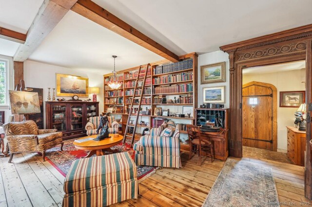 9 Columbus Ave, East Lyme, CT 06357 - sitting room featuring beam ceiling and wood-type flooring