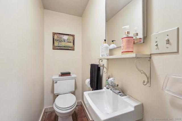 9 Columbus Ave, East Lyme, CT 06357 - bathroom with a sink, toilet, and baseboards