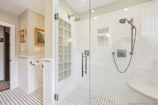 9 Columbus Ave, East Lyme, CT 06357 - full bath featuring a shower stall and wainscoting