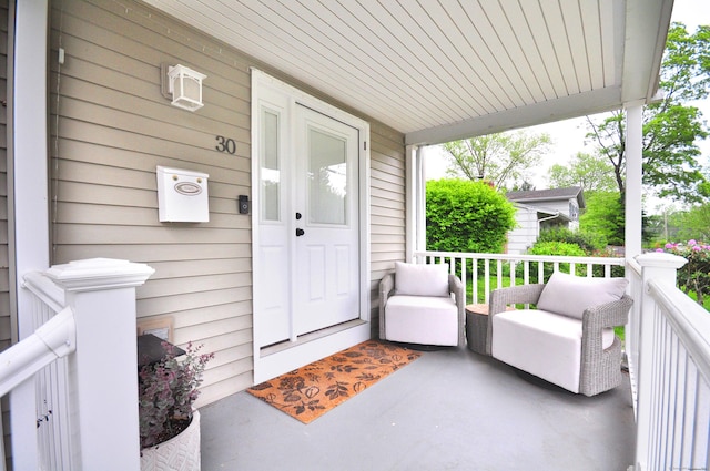 30 Taylor St, Windsor, CT 06095 - doorway to property featuring covered porch