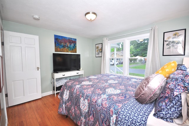 30 Taylor St, Windsor, CT 06095 - bedroom featuring wood-type flooring and baseboards