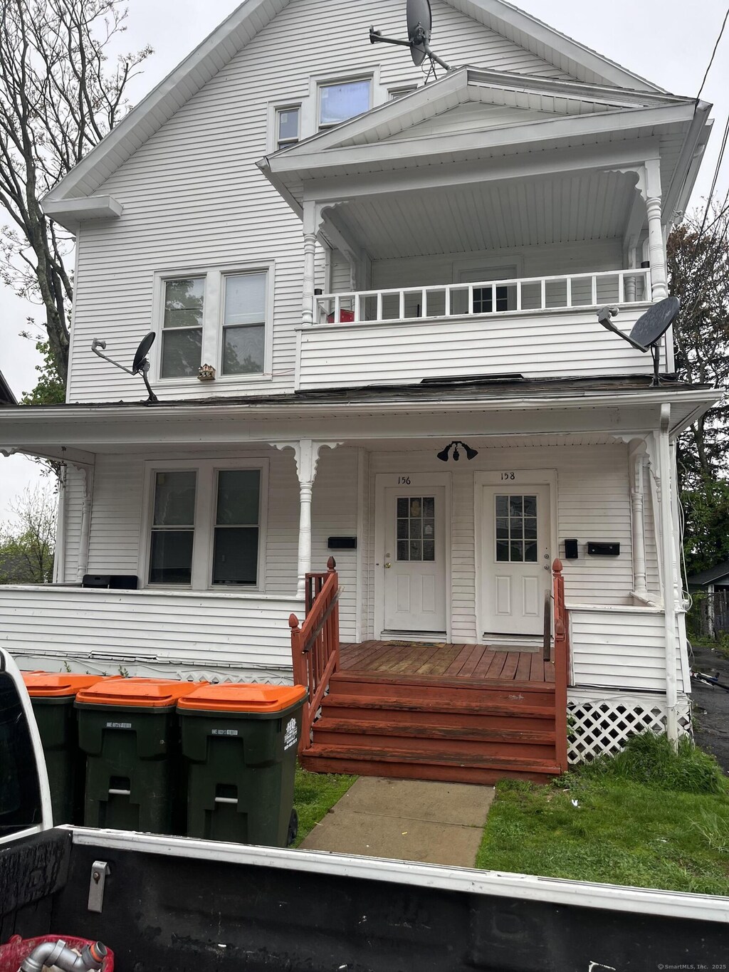 156 Hobart St, Meriden, CT 06450 - view of front of property featuring a porch and a balcony