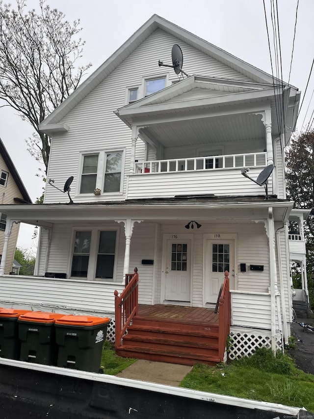 156 Hobart St, Meriden, CT 06450 - view of front facade with a balcony and a porch