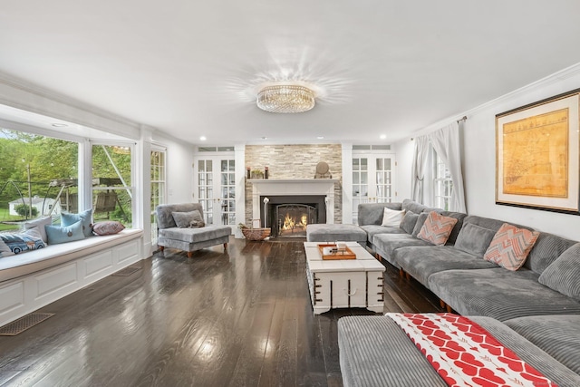 20 Fieldstone Dr, Easton, CT 06612 - living room with a fireplace, dark wood-style floors, plenty of natural light, and ornamental molding