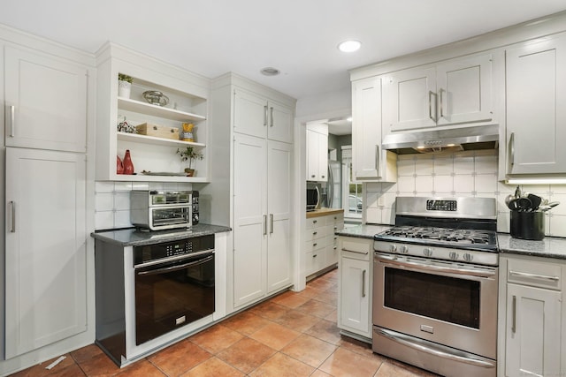 20 Fieldstone Dr, Easton, CT 06612 - kitchen with stainless steel gas range oven, oven, under cabinet range hood, backsplash, and open shelves