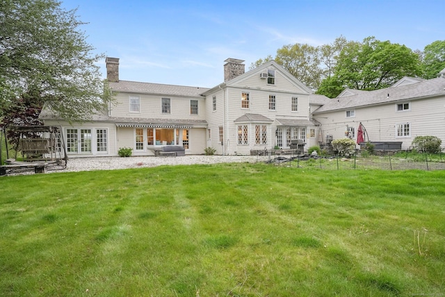 20 Fieldstone Dr, Easton, CT 06612 - rear view of house with a chimney and a patio