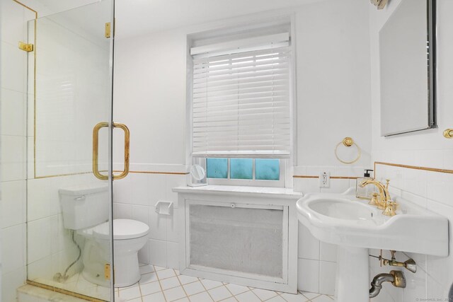 20 Fieldstone Dr, Easton, CT 06612 - full bath with tile walls, toilet, wainscoting, and tile patterned floors