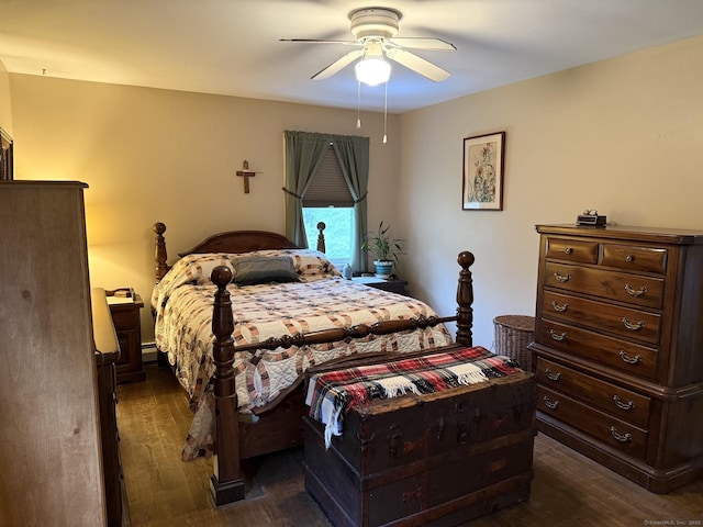 bedroom with dark wood-style flooring, a ceiling fan, and a baseboard radiator