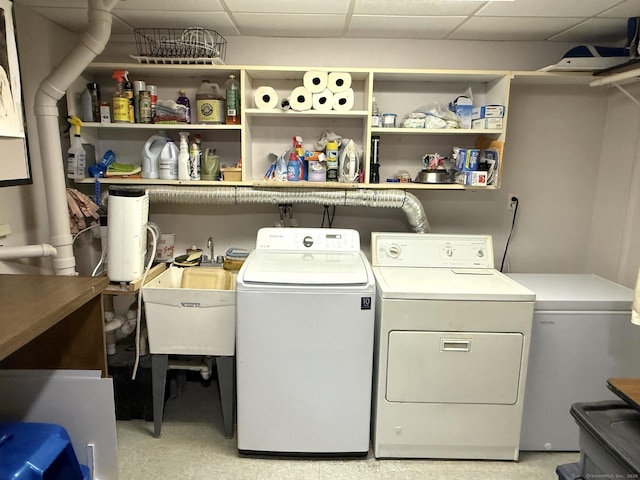 laundry room featuring washing machine and dryer