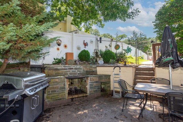 44 Laurel Point Dr, Montville, CT 06370 - fenced backyard featuring area for grilling and a patio