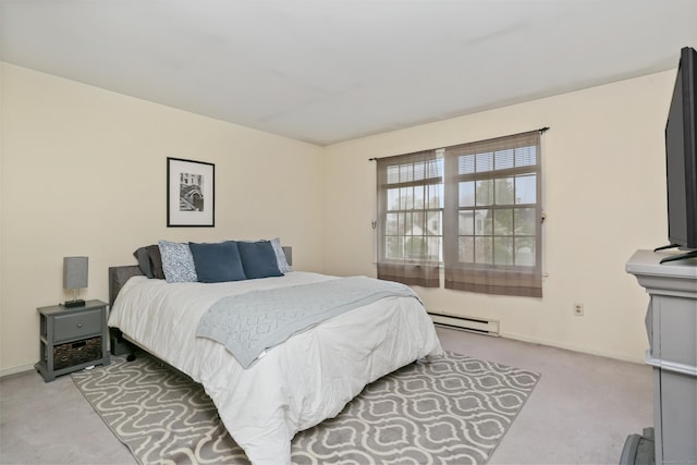 bedroom featuring a baseboard radiator, light colored carpet, and baseboards