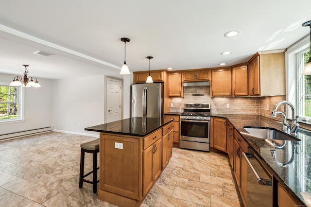 138 Flood Rd, Marlborough, CT 06447 - kitchen featuring stainless steel appliances, a sink, plenty of natural light, a baseboard heating unit, and recessed lighting