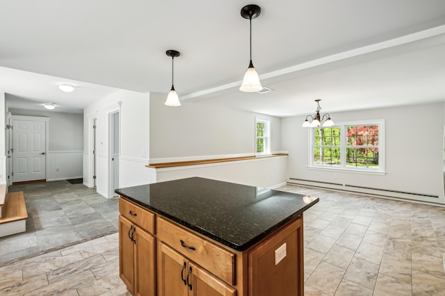 138 Flood Rd, Marlborough, CT 06447 - kitchen with baseboard heating, a kitchen island, decorative light fixtures, brown cabinets, and a chandelier